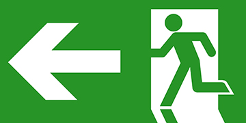 Znak kierunek do wyjścia ewakuacyjnego w lewo